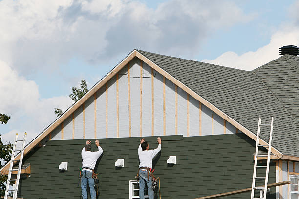 Professional Emergency Siding Repair technician working in Rougemont, NC